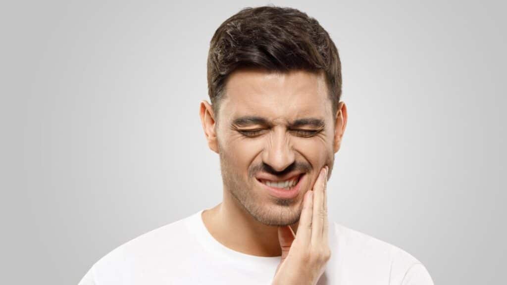 How do I alleviate tooth pain at home?